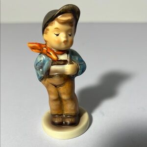 Charming Hummel Boy Figurine with Orange Scarf  “Lucky Fellow” 1989. GH117